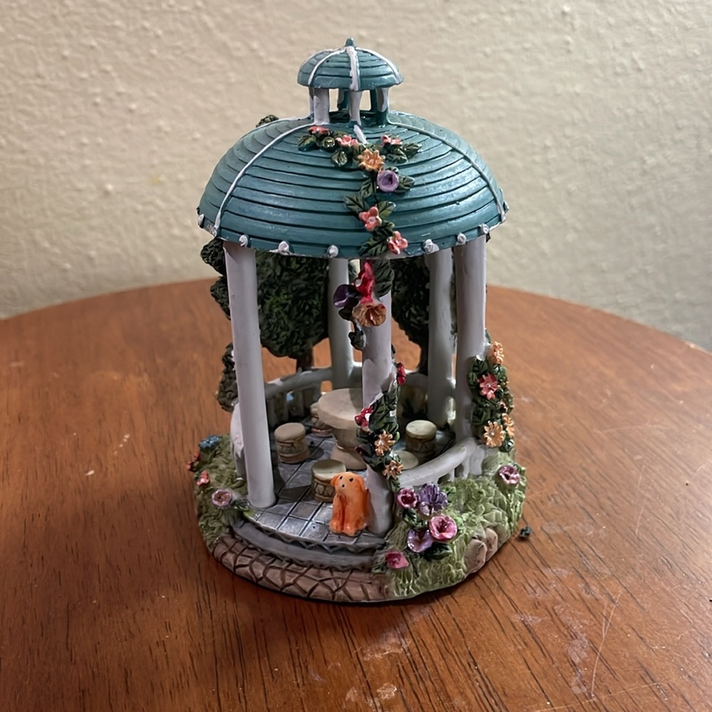 Puppy in a gazebo decoration
